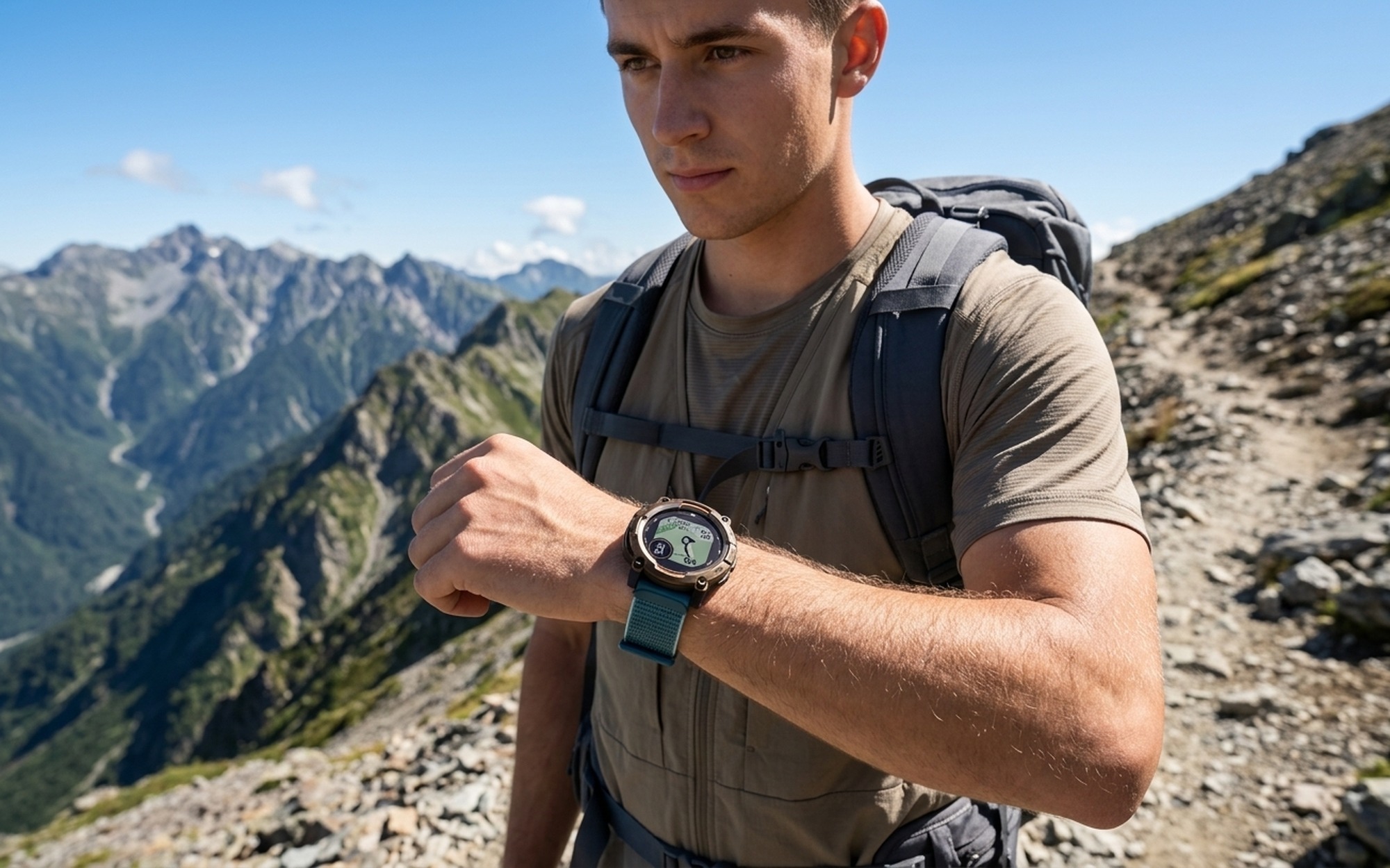 Garmin Instinct 3 Solar rugged GPS watch on a hiker's wrist checking the MIP display on an alpine mountain trail