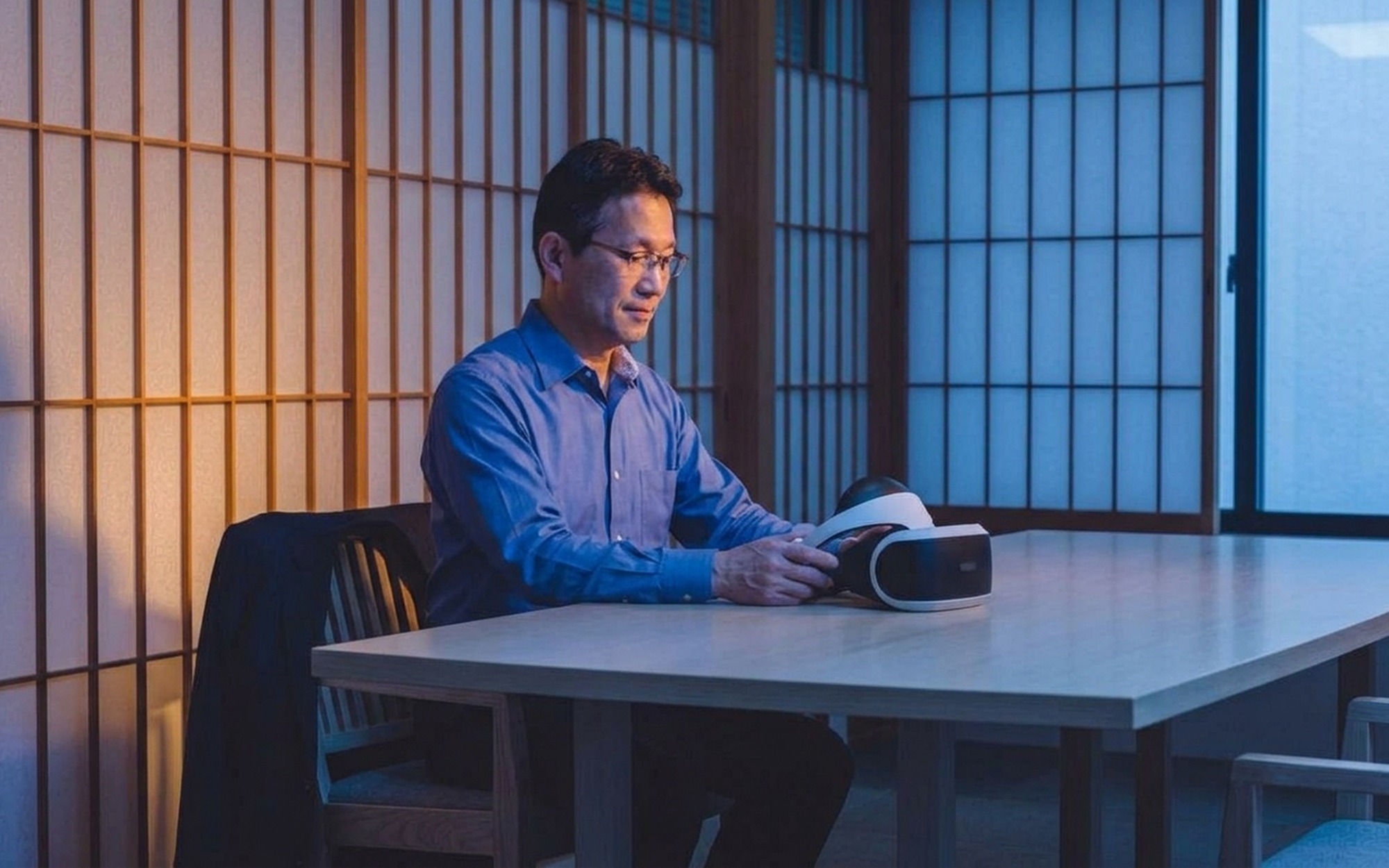 Person taking a break from PlayStation VR session, sitting back on couch to prevent motion sickness