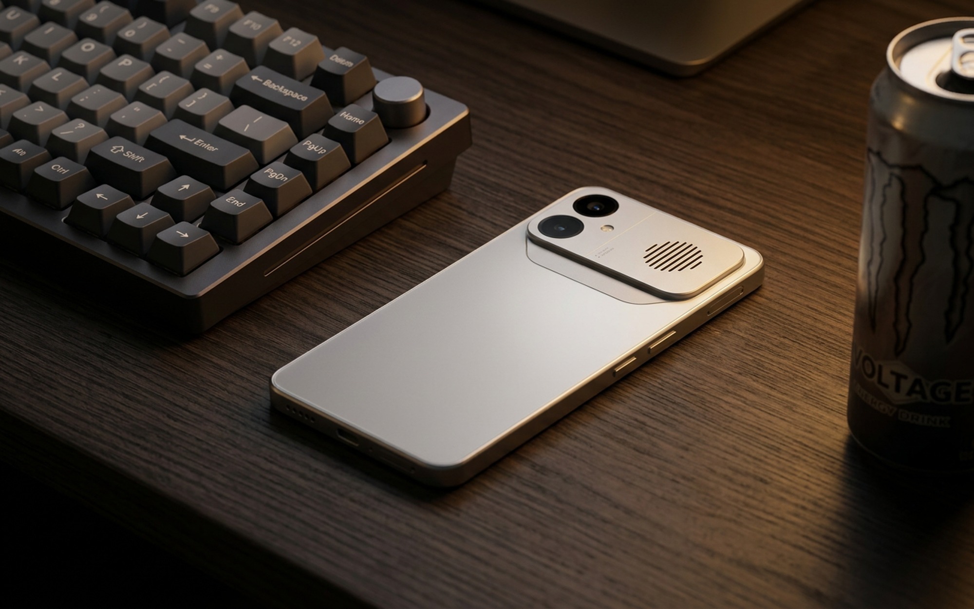 REDMI K90 Max lying face-down on wooden desk showing distinctive dual camera module and active cooling fan ventilation grille