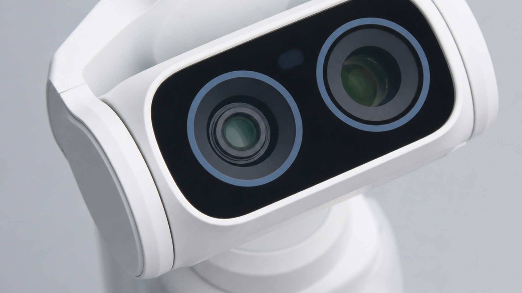 Close-up of the dual Leica lens camera head on the white Insta360 Luna Ultra handheld gimbal camera