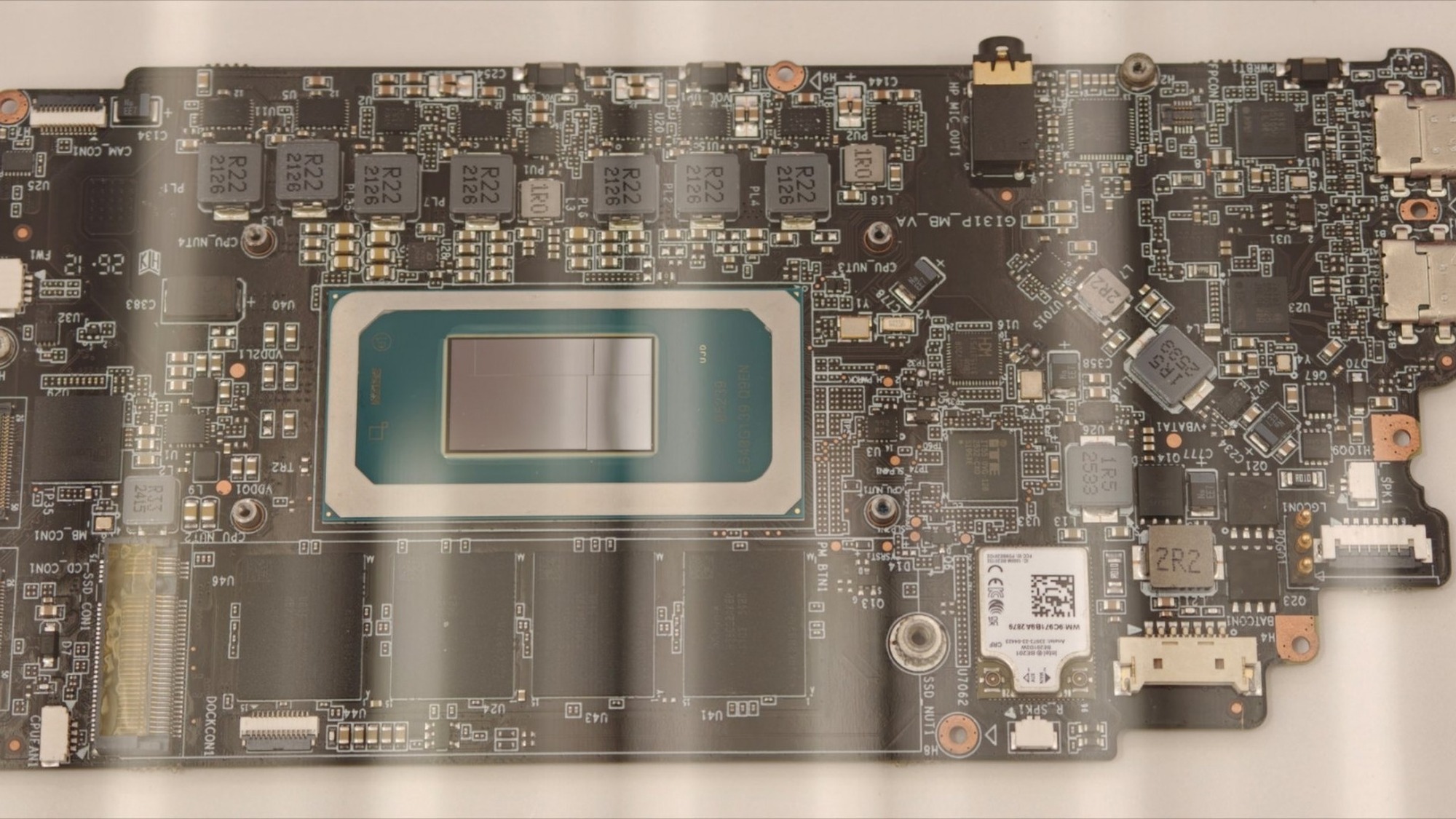 Close up of the OneXPlayer 3 motherboard showing the Intel Arc G3 Extreme Panther Lake chip and the power delivery components