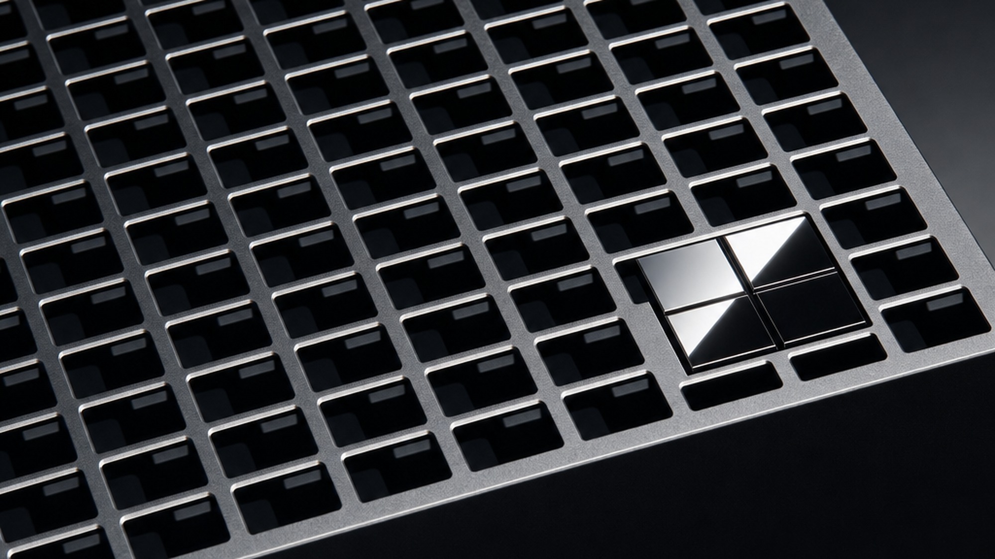 Close up of the Surface RTX Spark Dev Box aluminum chassis showing the 1000 grid air vents on top
