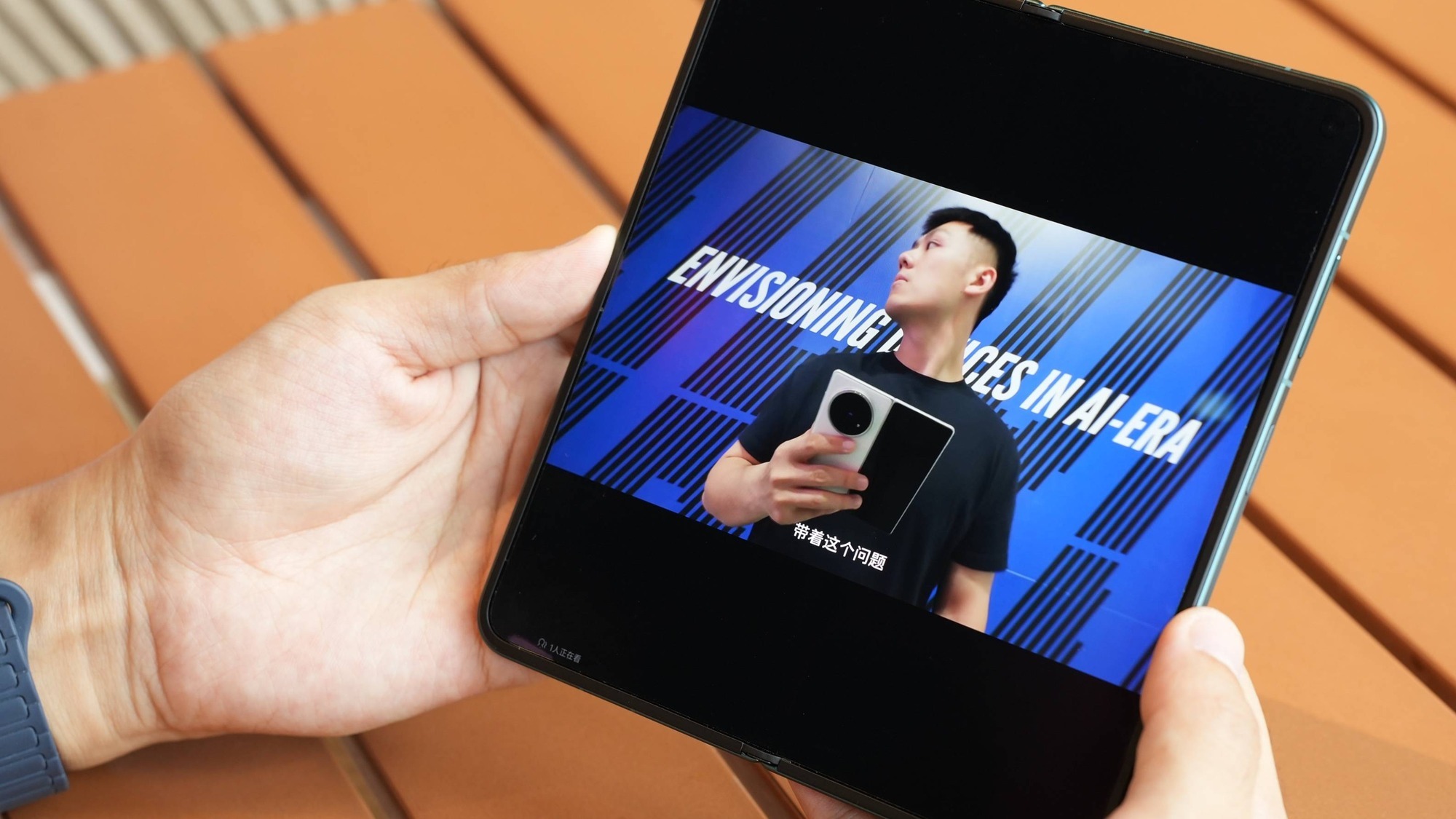 Hands holding the unfolded vivo X Fold6 with its 8.02 inch inner display, the base of foldable phone productivity