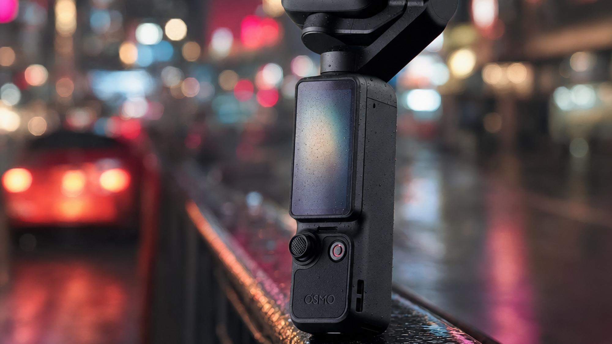 DJI Osmo Pocket 4P handheld on a neon-lit night street showing low-light video shooting with the dual-camera gimbal
